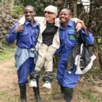 Discover the pros and cons of hiring a porter for gorilla trekking in Rwanda and Uganda. Learn how porters enhance your experience, support conservation, and what to expect during your trek.